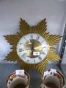 A QUARTZ SUNBURST CLOCK