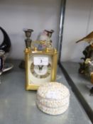 A PAIR OF ELECTROPLATE TABLE CANDLESTICKS; 'TIMEMASTER' QUARTZ MANTEL CLOCK; A DECORATED EGG