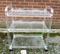 A MODERN CLEAR PERSPEX THREE-TIER TEA TROLLEY