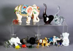 COLLECTION OF 16 VARIOUS MODELS OF ELEPHANTS in glass, porcelain, metal, hardstone, etc.