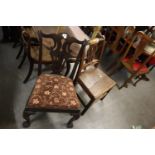 A GEORGE III MAHOGANY HALL CHAIR, AND A CHIPPENDALE STYLE MAHOGANY DINING CHAIR WITH DROP-IN SEAT (