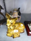 A PLASTIC GROUP OF A DEER AND FAUN SEATED; A RESIN MODEL OF A KITTEN PLAYING WITH A BALL OF WOOL;