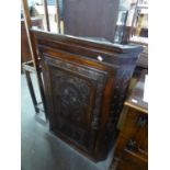 GEORGE III OAK CORNER CABINET WITH MACCLESFIELD CARVING