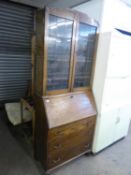 OAK BUREAU BOOKCASE WITH TWO LEAD LIGHT DOORS