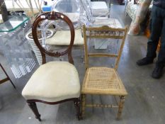 A GOOD QUALITY MAHOGANY FRAMED SPOON BACK DINING CHAIR AND A CANE SEATED OAK BEDROOM CHAIR (2)