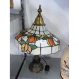 TIFFANY STYLE METAL TABLE LAMP WITH LEADED AND STAINED GLASS DOMED SHADE