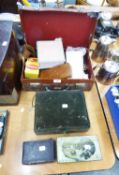 BROWN LEATHER SMALL SUITCASE CONTAINING POSTCARDS, SEWING ITEMS AND MINOR COLLECTABLES