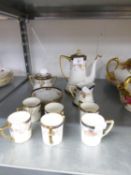 NORITAKE JAPANESE PORCELAIN COFFEE SERVICE OF 15 PIECES, WITH FLORAL DECORATION WITH BLUE AND GILT