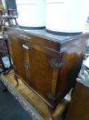 WALNUT STEREO CABINET, WITH LIFT-UP TOP AND TWO CUPBOARDS