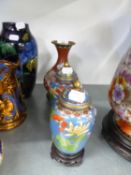 A PAIR OF CHINESE BLUE AND FLORAL CLOISONNÉ VASES AND COVERS, 6” HIGH AND ANOTHER WITH LONG NECK,