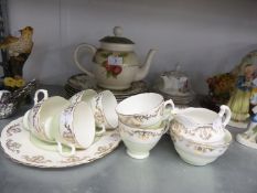 ROYAL VALE WHITE AND GILT CHINA TEA SERVICE FOR SIX PERSONS, 20 PIECES; A SET OF SIX ‘STOKE POTTERY’