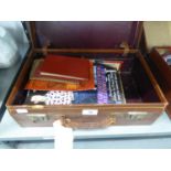 A BRIEFCASE CONTAINING EPHEMERA, BOOKS OF POSTCARDS, ROYAL COMMEMORATIVE BOOKLETS, ETC.