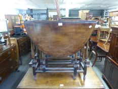 A SMALL MAHOGANY GATE LEG DINING TABLE, ON SLENDER BALUSTER SUPPORTS, 2’6” WIDE, 3’6” LONG