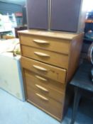 AUSTIN SUITE TEAK CHEST OF SIX GRADUATED LONG DRAWERS, 2’1! WIDE, 3’10” HIGH