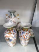 A PAIR OF MODERN CHINESE PORCELAIN OVULAR VASES AND A PAIR OF PORCELAIN VASES WITH CARYATID