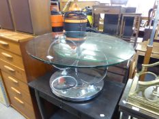 A STYLISH CHROME BASE COFFEE TABLE, WITH DOUBLE CIRCULAR GLASS TOP (ONE GLASS DETACHED)