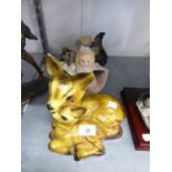 A PLASTIC GROUP OF A DEER AND FAUN SEATED; A RESIN MODEL OF A KITTEN PLAYING WITH A BALL OF WOOL;