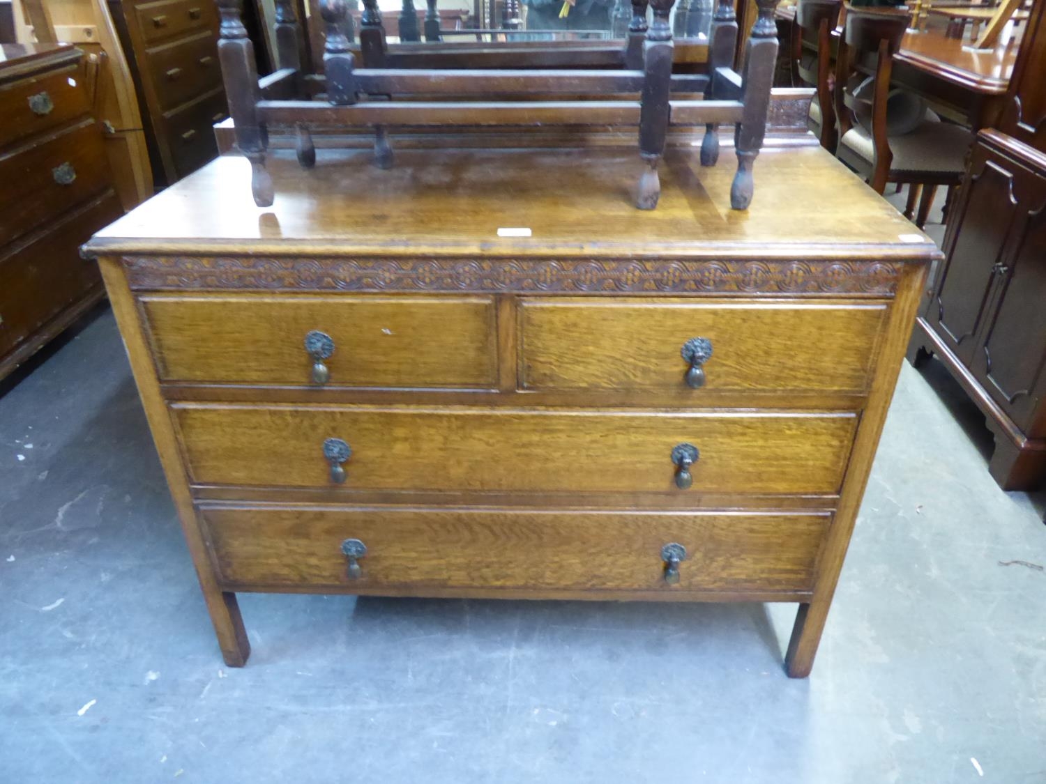 1920’S OAK DRESSING CHEST WITH TWO SHORT AND TWO LONG DRAWERS AND SWING MIRROR