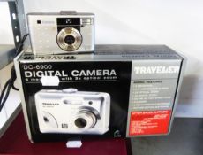 TRAVELER DC6900 DIGITAL CAMERA, 6 MEGAPIXELS, 2.4” COLOUR SCREEN, BOXED AND A KONICA ‘REVIO’ Z2