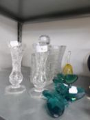 A HEAVY CUT GLASS HEXAGONAL FLOWER VASE; A PAIR OF CUT GLASS SMALL PEDESTAL VASES; A PAIR OF BLUE