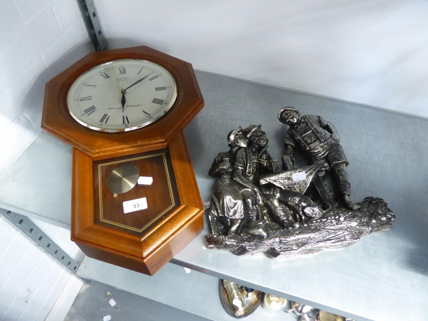 SEIKO QUARTZ MAHOGANY DROP DIAL WALL CLOCK AND A SILVERED WALL ORNAMENT OF A TAVERN SCENE WITH THREE