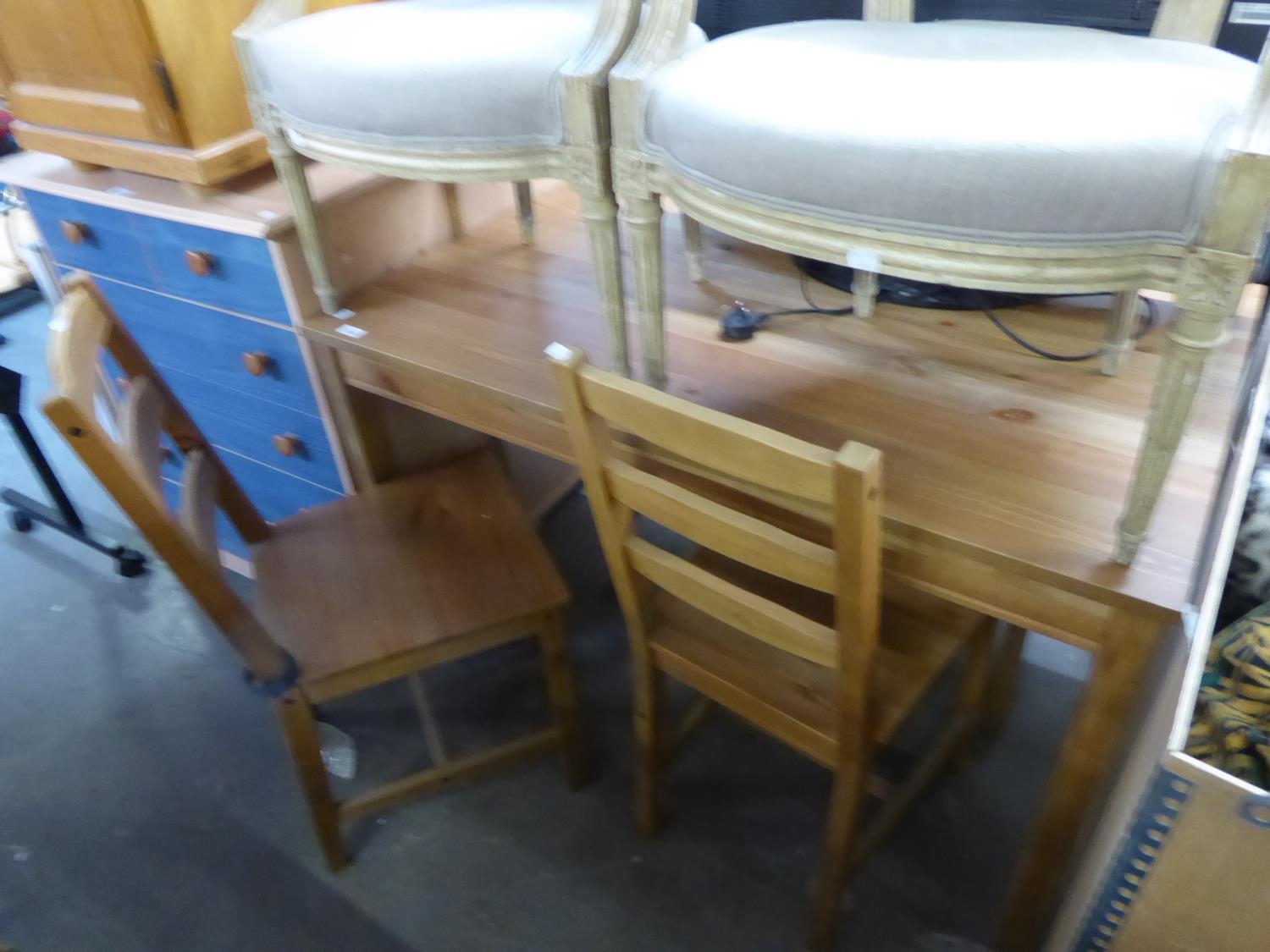 A SET OF FOUR PINE LADDER BACK SINGLE CHAIRS WITH PANEL SEATS, WITH LOOSE SQUAB CUSHIONS AND A