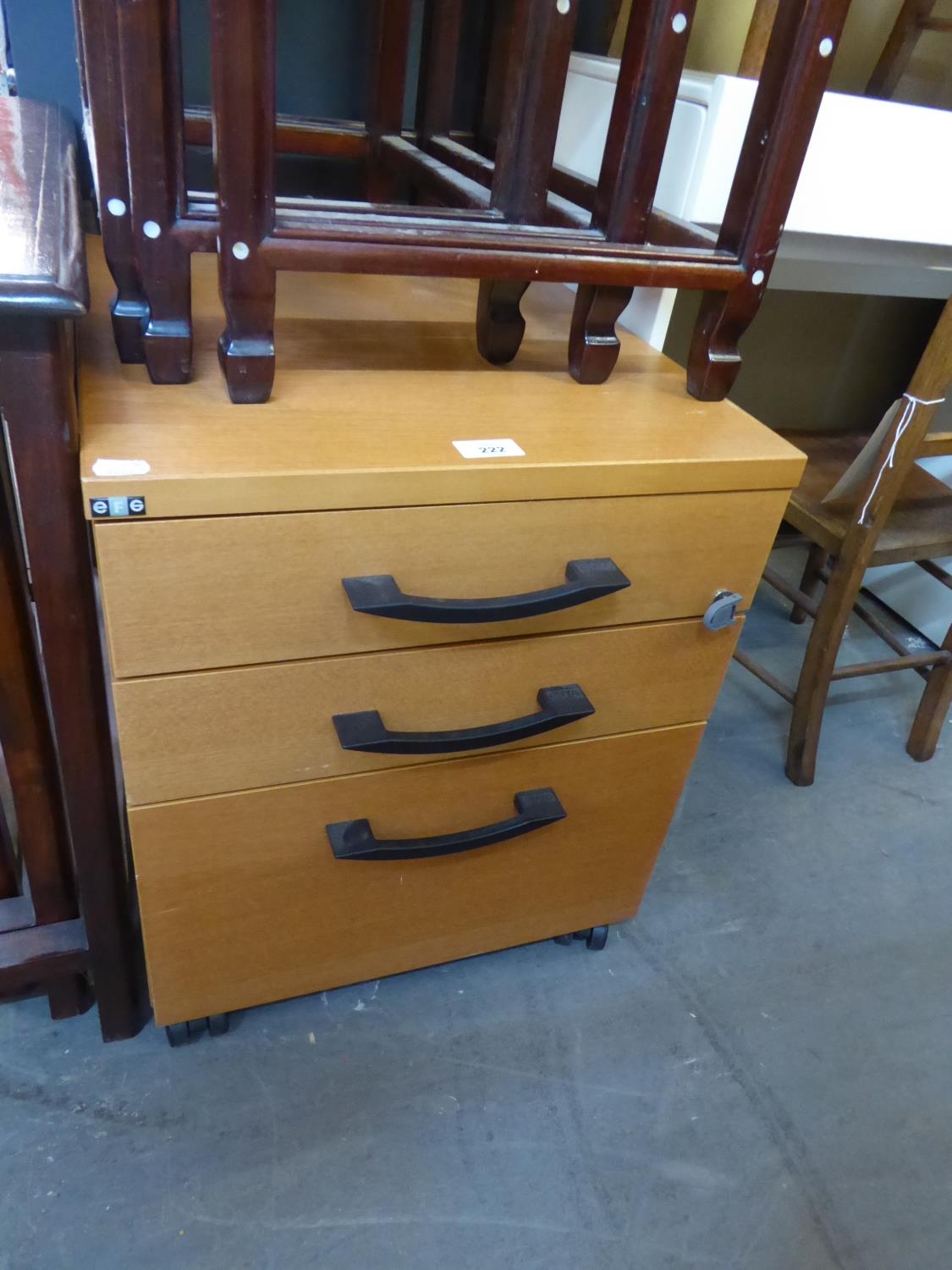 A NEST OF THREE BEECH EFFECT DRAWERS WITH METAL LINERS AND LOCKS