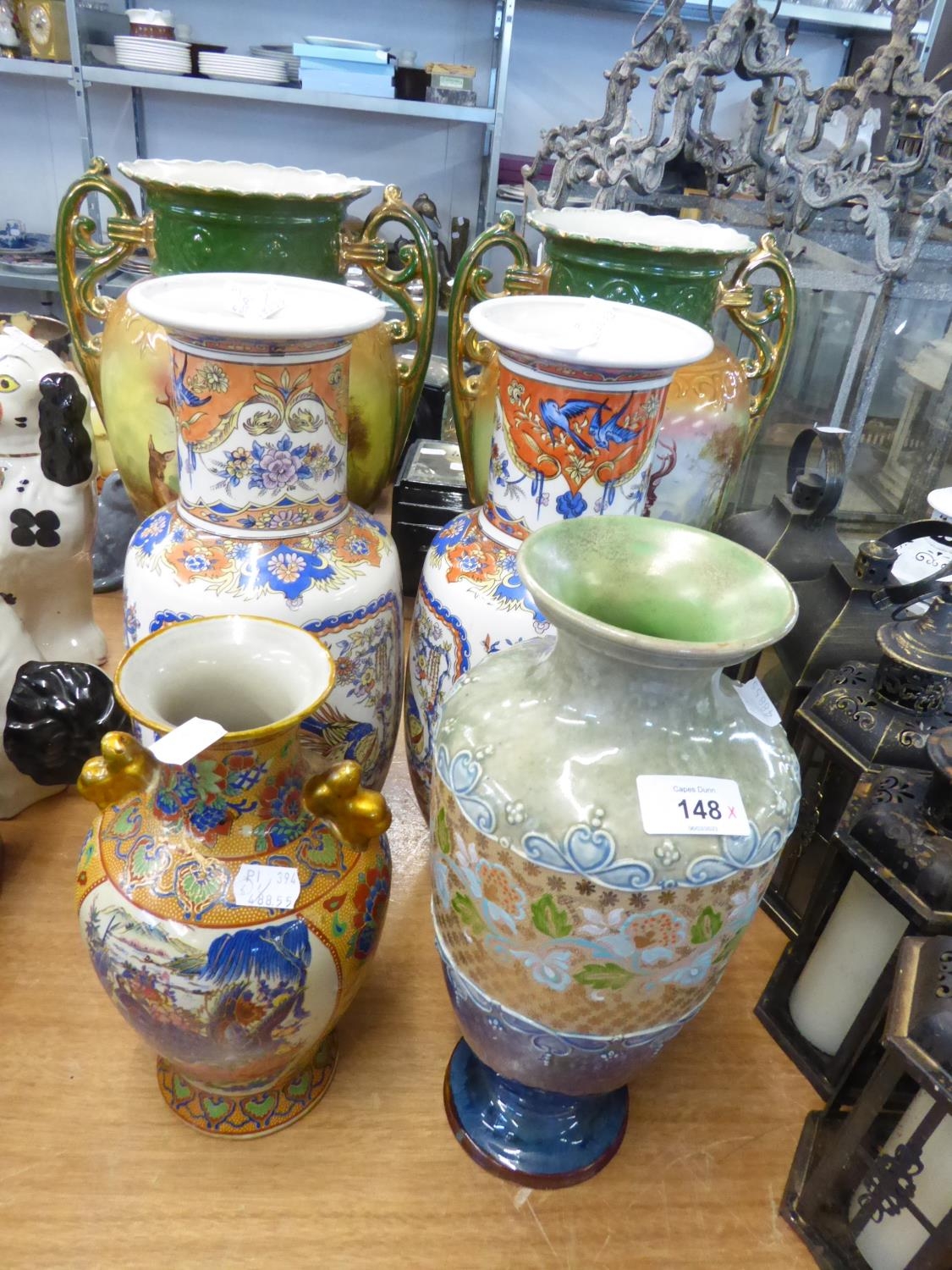 A PAIR OF GEORGE V CERAMIC VASES DECORATED WITH STAGS, PLUS A PAIR OF CHINOISERIE BALUSTER VASES AND