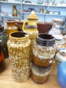 THREE WEST GERMAN STYLISH MOULDED POTTERY CYLINDRICAL VASES, AND A SIMILAR JUG, 18” (45.7CM) HIGH