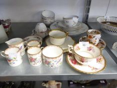 A SET OF THREE COALPORT CHINA ‘PEMBROKE’ BIRD AND FLORAL PATTERN COFFEE CUPS AND SAUCERS, MATCHING