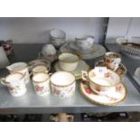 A SET OF THREE COALPORT CHINA ‘PEMBROKE’ BIRD AND FLORAL PATTERN COFFEE CUPS AND SAUCERS, MATCHING