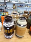 FOUR WEST GERMAN STYLISH POTTERY VASES, CYLINDRICAL OR NEAR, 16” (40.6CM) HIGH AND VERY SLIGHTLY
