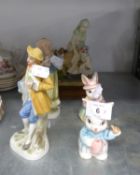 A RESIN GROUP OF A LADY AND CHILD WITH WHEEL, ON WOODEN BASE; A PAIR OF TINTED BISQUE FIGURES; A