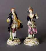 TWO DERBY FIGURE GROUPS, one as a gentleman in frock coat, the other a lady with flowers in her