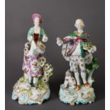 PAIR OF PATCH PERIOD DERBY FIGURE GROUPS, as a gentleman and lady in 18th century dress, he with