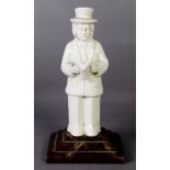 CHINESE BLANC DE CHINE PORCELAIN FIGURE OF ABRAHAM LINCOLN, standing reading a book, 6in (15.2cm)