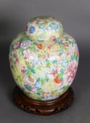 CHINESE QING DYNASTY PORCELAIN MILLE-FLEURS 'HUNDRED FLOWERS' FAMILLE ROSE ENAMELLED GINGER JAR WITH