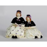 ROYAL WORCESTER PORCELAIN GROUP, modelled as two sisters, wearing matching dresses and black shawls,