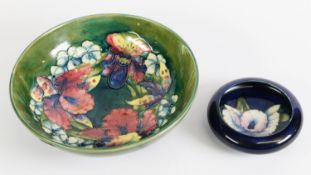 TWO PIECES OF WILLIAM MOORCROFT ORCHID PATTERN POTTERY, comprising: FOOTED SHALLOW BOWL, on a fading