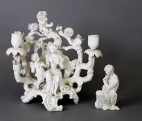 19TH CENTURY PARIAN FIGURAL CANDELABRA AS VENUS AND CUPID TO A FOLIATE BACKDROP ON ROCOCO BASE,