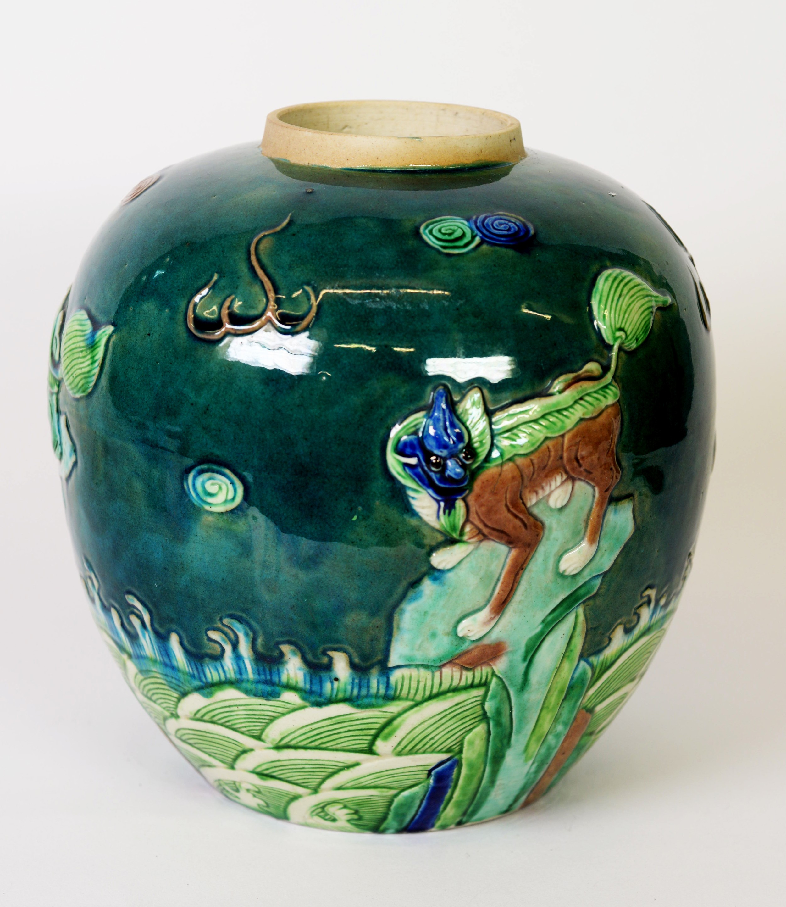 EARLY 19TH CENTURY CHINESE PORCELAIN GINGER JAR, polychrome relief decoration in the form of