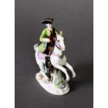 19TH CENTURY MEISSEN MINIATURE FIGURE, as a figure in tricorn hat mounted on rearing horse with
