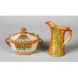 TWO PIECES OF EARLY TWENTIETH CENTURY ROYAL WORCESTER PORCELAIN COMPRISING: BLUSH GROUND TWO HANDLED