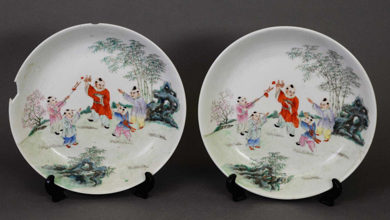 PAIR OF QIANLONG MARK AND PERIOD FAMILLE ROSE BOWLS, with polychrome scenes of children playing, 9