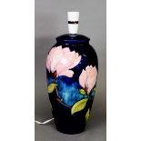 Moorcroft pottery tall ovular vase table lamp, with large red flowers on a royal blue ground, 13” (