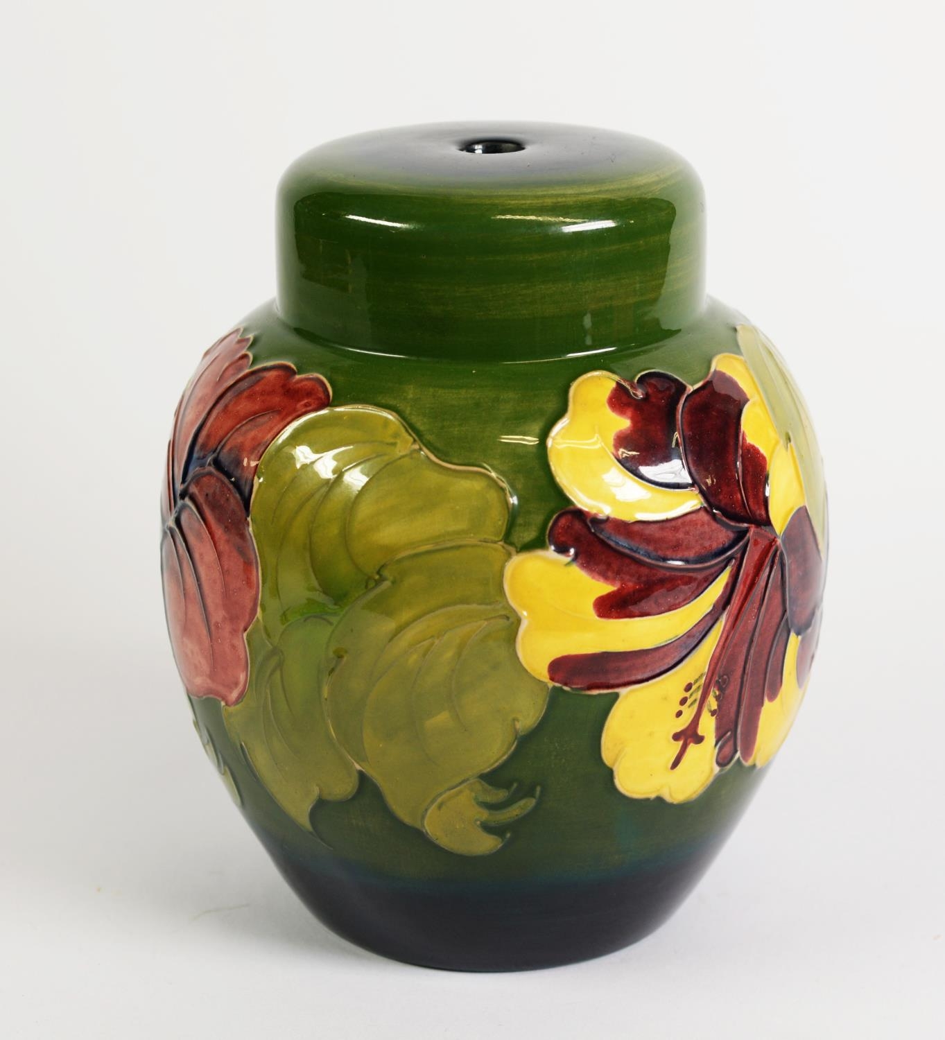 WALTER MOORCROFT HIBISCUS PATTERN TUBE LINED POTTERY TABLE LAMP BASE, of ginger jar form,