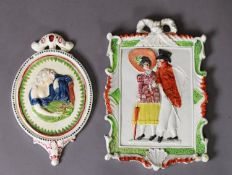 TWO PRATTWARE PLAQUES C.1790-1820, including one of a lady and gentleman in 18th century dress,
