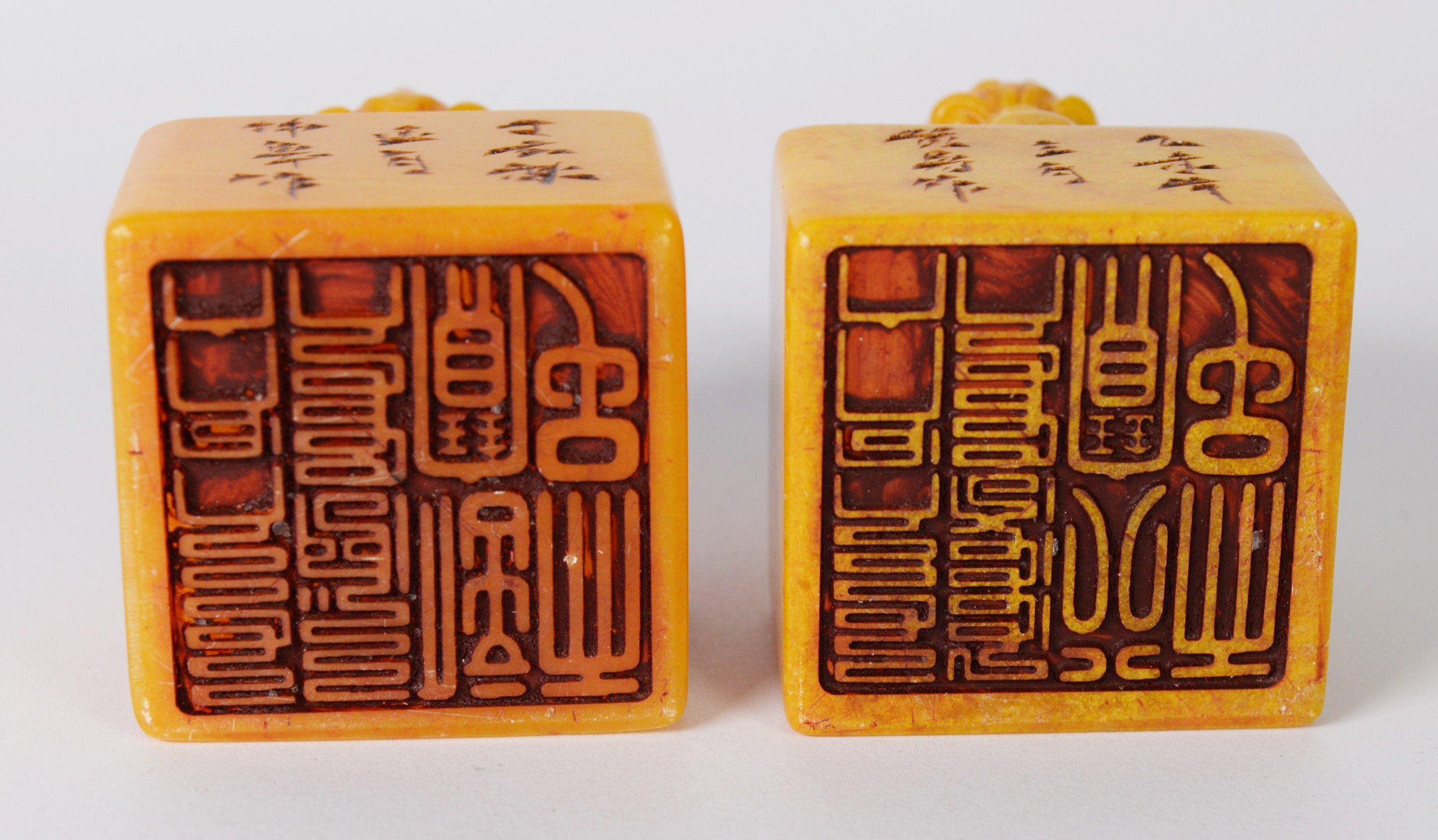 PAIR OF CHINESE YELLOW SOAPSTONE SEALS, the top handle of each carved as an Oni, one with head - Image 2 of 2