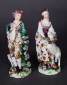 A PAIR OF PATCH PERIOD DERBY FIGURE GROUP OF A SHEPHERD AND SHEPHERDESS, c.1765, he with sheepdog