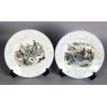 PAIR OF NINETEENTH CENTURY FRENCH POTTERY ‘NAPOLEON’ PLATES, from a series, each black printed